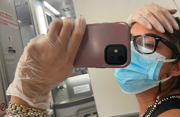 Chicago woman quarantined in airplane bathroom for 3 hours after testing positive for Covid-19 mid-flight
