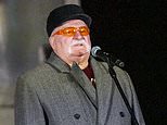 Former Polish president looks exactly like U2 frontman Bono with matching orange sunglasses