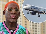 Dennis Rodman is confronted by cops after ignoring four requests to pull up his face mask