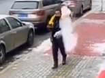 VIDEO: Chinese delivery driver is flattened by a lump of ice