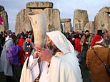 Dawn again! Stonehenge revellers celebrate the first sunrise after Winter Solstice