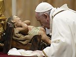Pope Francis leads Midnight Mass at the Vatican – while worshippers around the world gather
