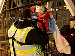 Young children are among 150 migrants arriving in Dover in heavy rain at midnight on Christmas Day