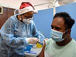 All I want for Christmas… is a Covid jab! NHS dishes out 12,000 vaccines on Dec 25