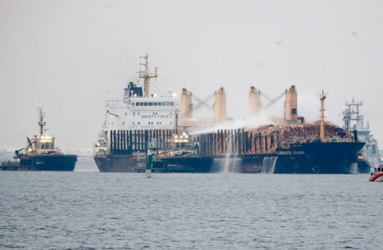 German ship with burning timber cargo towed to Swedish port