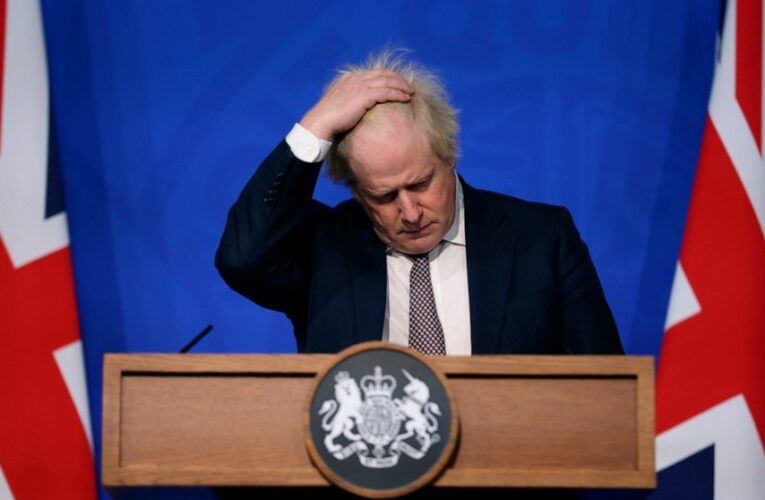 UK’s Johnson faces political threat in virus rules votes