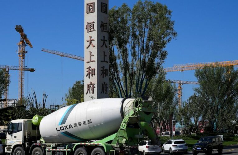 China tries to reassure on Evergrande as default fears rise