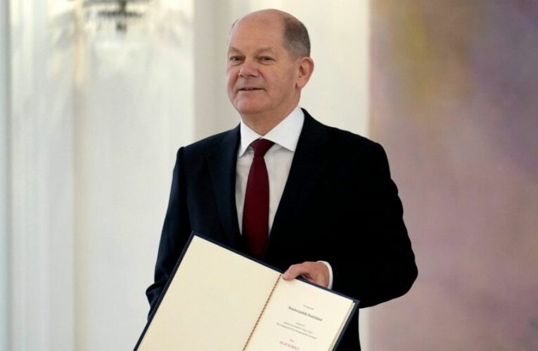 Scholz replaces Merkel as German chancellor, opening new era