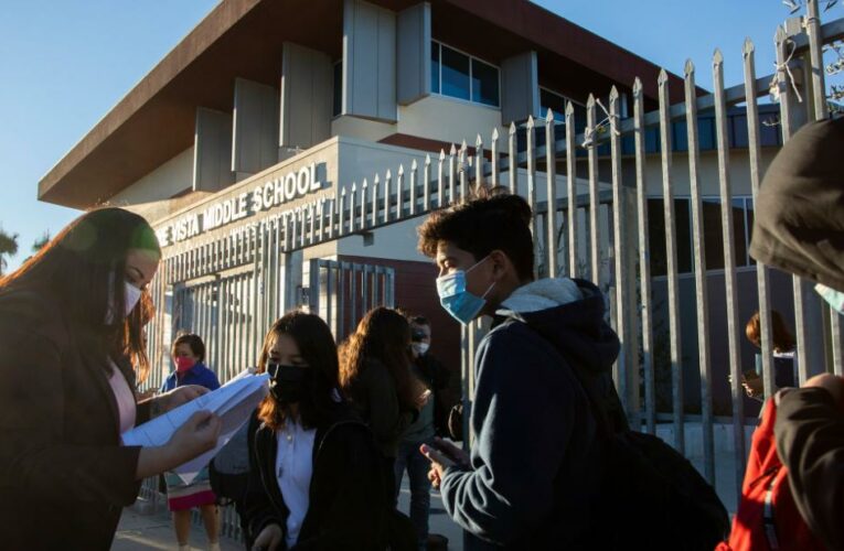 People need to change how they think about Covid and children, expert says,  as families face a dilemma over schools and Omicron