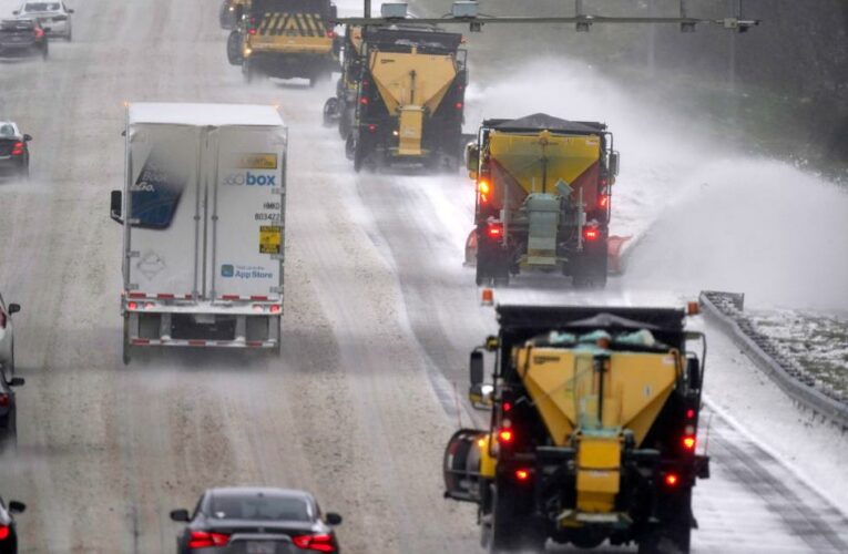 Guardsmen are assisting stranded motorists and more than 178,000 people are without power as snow and freezing rain pummel the area
