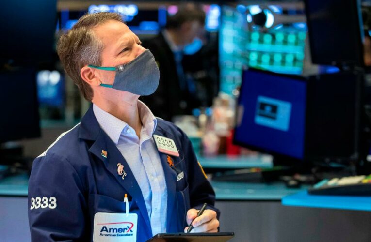 Stocks slide as volatility continues