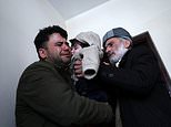Afghan baby who was handed to US servicemen in Kabul airlift is finally reunited with his family