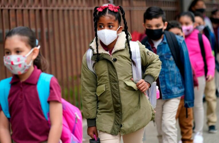 As states plan to lift school mask mandates, CDC remains vague on updating its guidance