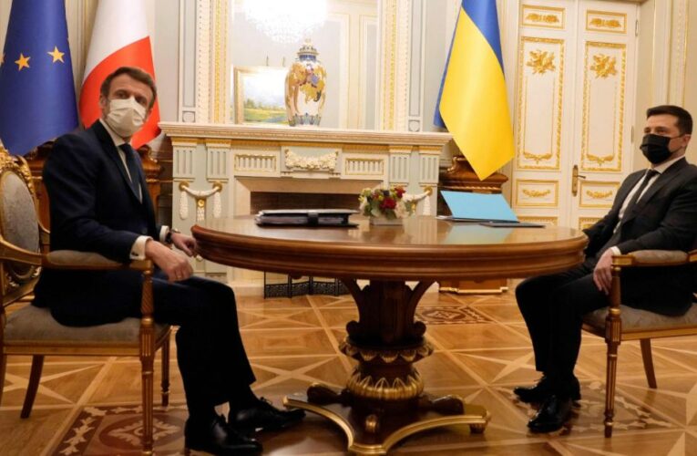 Russia pours cold water on Ukraine crisis de-escalation, as Macron meets with Zelensky
