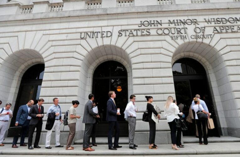 Court: Pilot, attendant will suffer under vaccine mandate