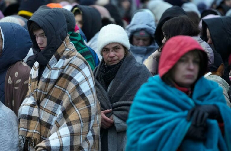 100 refugees a minute are crossing from Ukraine to Poland, officials say