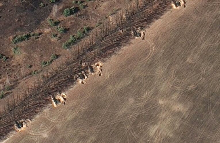 Russia is constructing earthen berms to protect military positions northwest of Kyiv, new satellite images show