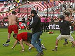 Mexican football league suspended after ‘up to 17’ fans killed and at least 26 injured after brawl