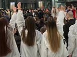 Brainwashed ‘patriotic flash mob’ of Russian students wearing ‘Z’ coats stage pro-war rally