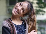 Teen who suffered from muscular condition that left head STUCK at 90-degree angle undergoes surgery