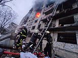 Bombs rain down on Kyiv apartment block, killing two as Putin’s forces edge closer to capital