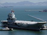 Hours before Biden and Xi Jinping are set to talk, China sails aircraft carrier through key strait