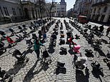 An empty pram for each of Putin’s 109 child victims as many remain entombed in destroyed theatre