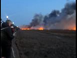Arson probe launched after wall of flames tears through 500 sqm marshland site in Cheshire