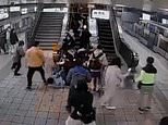 Station escalator suddenly collapses, sending scores of passengers flying backwards in Tapei [Video]