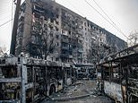 Footage shows civilians weaving their car between dead bodies in apocalyptic scenes from Mariupol