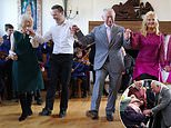 Prince Charles and the Duchess of Cornwall beam as they visit a market in County Tipperary