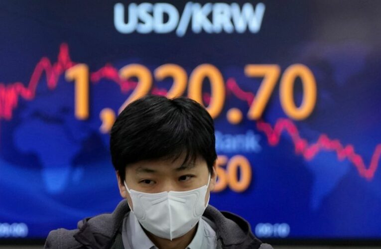 Brent crude up $12, shares sink as Ukraine conflict deepens