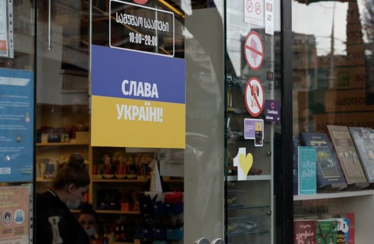 Leaving home: These Russians are turning on Putin and burned an effigy of him