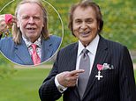 Engelbert Humperdinck, 85, beams as he is made an MBE in investiture service at Windsor Castle 