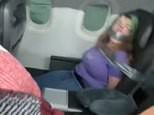 American Airlines passenger who was duct-taped to her seat is hit with $82,000 fine
