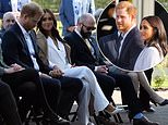Invictus Games: Harry is comforted by Meghan as he takes his seat for start of event