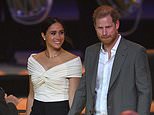 Harry and Meghan make their grand entrance at the Invictus Games Opening Ceremony