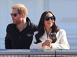 Prince Harry and Meghan Markle are flanked by five security guards at the Invictus Games