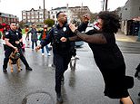 Wild photo shows black cop PUNCHING black protester who lunged at him