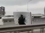 Motorcyclist rides along Turkish highway with a MATTRESS between him and his passenger [Video]