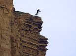 Now that’s a Broadchurch cliffhanger! Amazing images show jumper leaping from crumbling Dorset rocks