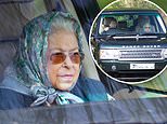 Queen, 96, is driven to visit her horses at Sandringham