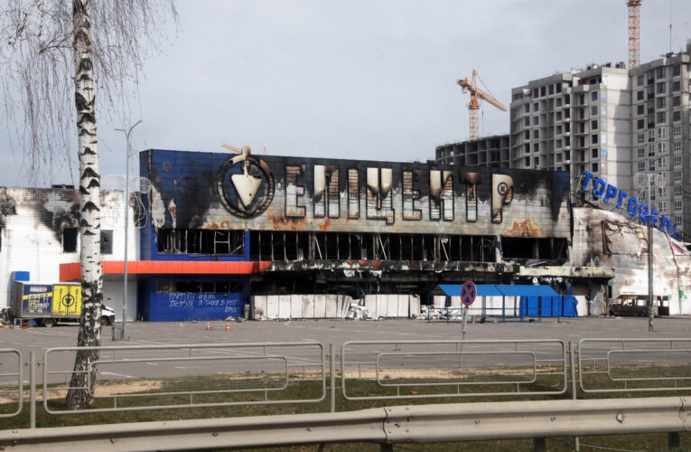 Moscow was placed under ‘selective default’ on its foreign debt as Zelensky warned of a full-scale attack in the east