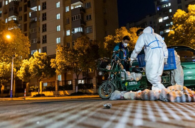 Shanghai eases 2-week shutdown, letting some residents out