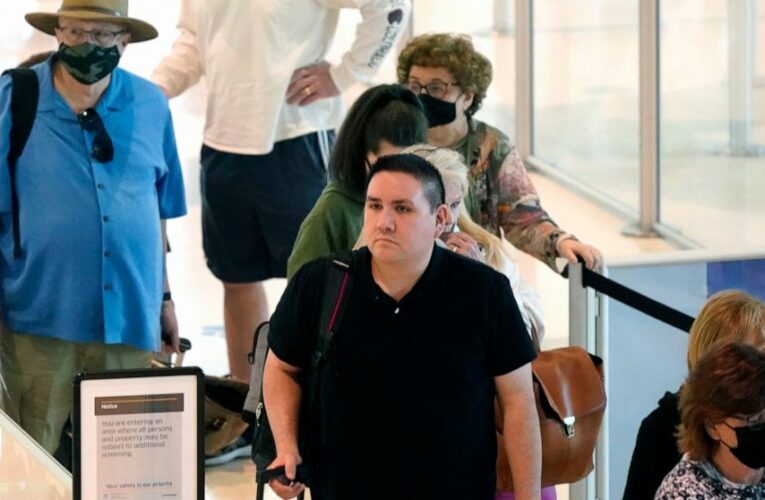 Most people in US want masks for travelers: AP-NORC poll