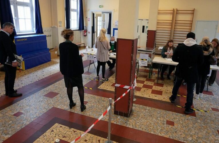 Live updates | French projections show victory for Macron