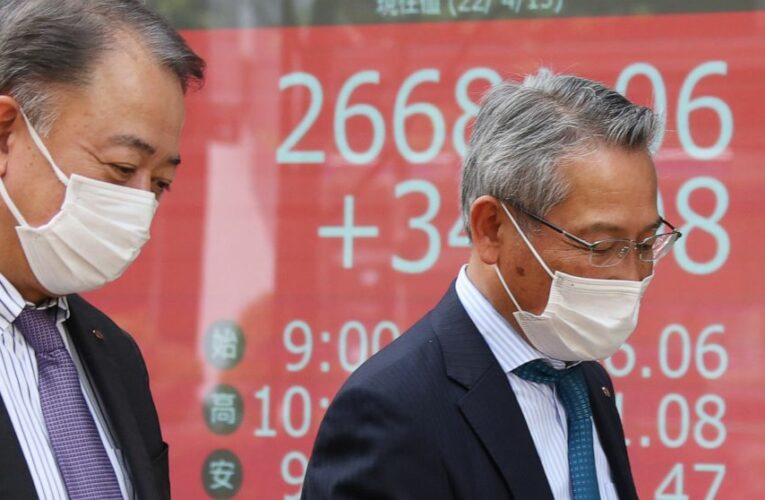 US futures slip as investors weigh profit reports, inflation