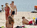 Britons set to pack beaches and parks as temperatures hit 23C and will get even hotter next week