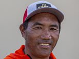 Nepalese Sherpa, 52, scales Mount Everest for 26th time to beat his own record for the most climbs