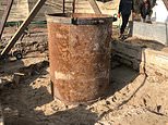 Treasure hunters seeking Nazi gold worth £200MILLION say they discovered a 5ft metal canister buried